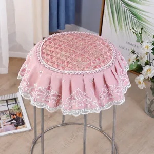 Pink lace round stool cover with quilted embroidery design, non-slip floral chair pad for home.
