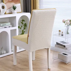 Vue détaillée de la housse de chaise élastique avec dossier texturé et assise jaune.