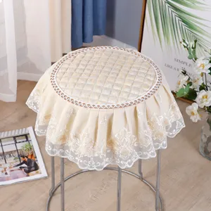 Detail view of round stool cover lace fabric quilted cushion chair pad home decor beige