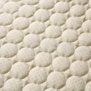 Λεπτομερής όψη της υφής του παχέος αντιολισθητικού μαξιλαριού καθίσματος με στρογγυλό σχέδιο.
