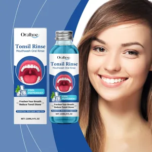 Close-up detail of Oralhoe mint mouthwash bottle and box with fresh refreshing liquid.