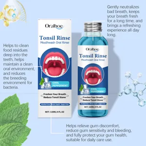 Detailed view of the herbal mint mouthwash liquid bottle and packaging box close up.