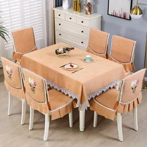 Set di tovaglia e coprisedia trapuntati arancioni con pizzo elegante e ricamo di tulipani.