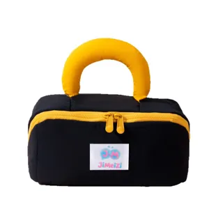 Stylish portable pillow cosmetic bag with yellow marshmallow handle in black finish