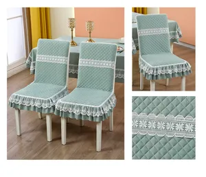 Detailed view of mint green quilted chair covers featuring elegant white lace trim