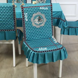 Detail showing measurements of peacock blue quilted chair cover with swan embroidery
