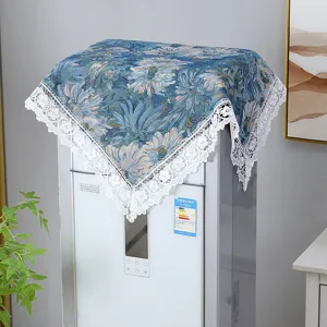 Vintage floral dust cover with elegant white lace trim, perfect for home decor and appliance protection.