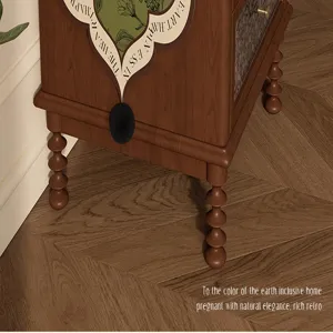 Vintage wooden bedside cabinet with retro fabric cover and elegant turned legs for home decor.