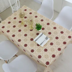 Elegante mantel de encaje con exquisito bordado floral rojo para la mesa de comedor.