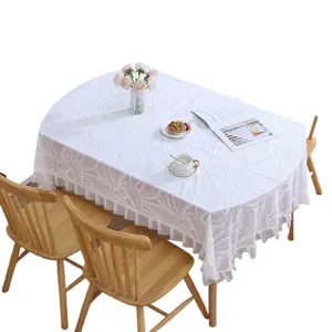 Vintage pastoral white lace tablecloth with hollow leaf pattern for elegant dining table decor.