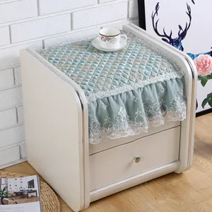 Quilted bedside table dust cover with elegant lace trim, multi-functional decorative cloth.