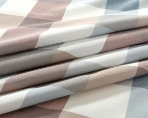 Vue détaillée de la texture du tissu à carreaux imperméable avec un joli design moderne.