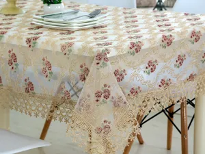 Elegante mantel de encaje con bordado floral vintage y borde de borlas para la mesa.