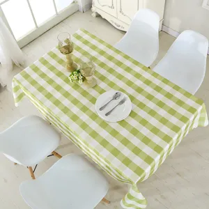 Nappe rectangulaire imperméable à carreaux vert et blanc pour décoration de table à manger.