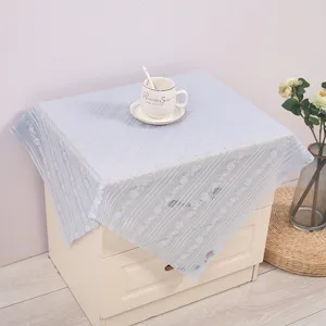 Lace dust cover for bedside table, microwave, and appliances. Elegant blue fabric protector.