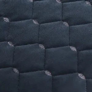 Close-up detail of thickened square stool cover fabric with textured quilted design.