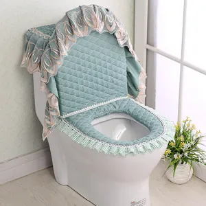 Quilted green toilet seat cover set with elegant lace embroidery, 3-piece bathroom decor.