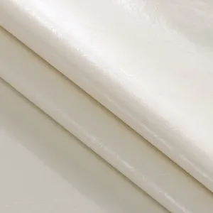 White PU leather material fabric texture close up view waterproof tablecloth fabric detail
