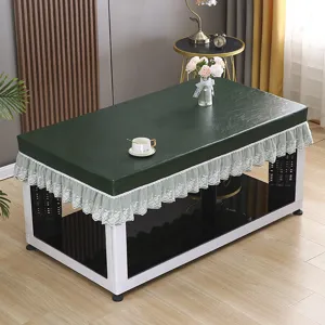 Dark green PU leather tablecloth with white lace trim, waterproof and heat resistant cover.