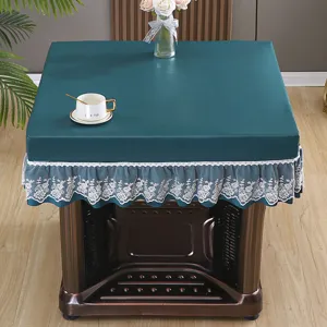 Dark green PU leather electric heater table cover with white lace trim, waterproof and durable.