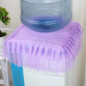Detail shot of the purple lace water dispenser cover with elegant ruffled hem and texture.
