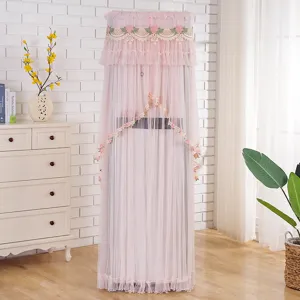 Elegante copertura in pizzo rosa per condizionatore verticale con decorazioni floreali