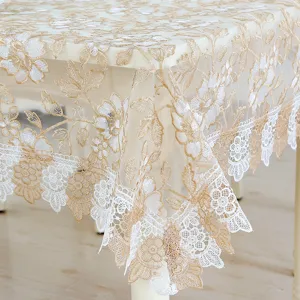 Elegant floral embroidered lace tablecloth with sheer hollow design, perfect for home table decor.