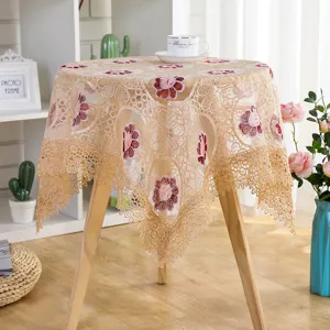 Beige lace embroidered tablecloth, hollow floral table cover for home dining table decoration.