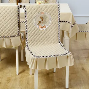 Quilted velvet dining chair cover set with embroidered deer design, soft padded furniture protector.