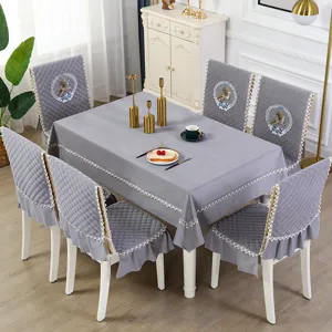 Grey quilted velvet dining chair cover and tablecloth set with lace and deer embroidery detail.