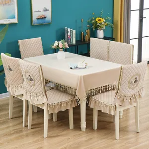 Beige dining table cloth and chair cover set with elegant swan embroidery and plush velvet.