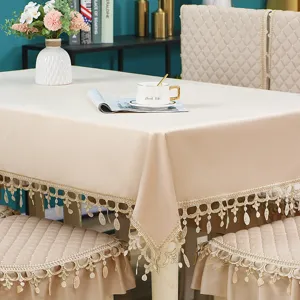 Italian velvet tablecloth and dining chair cushion set with elegant lace fringe, perfect home decor.