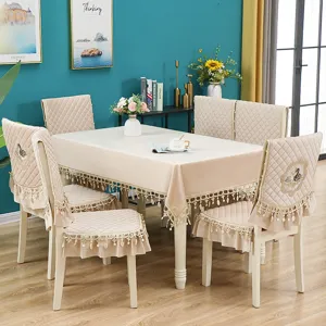 Luxury velvet dining table cloth and chair cushion set with elegant lace tassel trim for home.