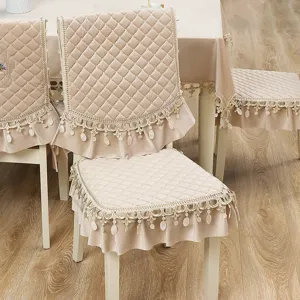 Beige velvet dining chair cover and tablecloth set with quilted pattern and lace tassel trim.