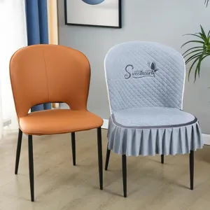 Detailed view of Italian high-end quilted dining chair cover with cute skirt and backrest.