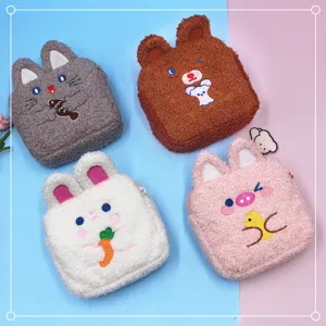 Set of 4 cute cartoon animal plush pouches in gray, brown, white and pink with zippers.