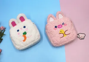 Cute plush storage pouches featuring rabbit and pig designs with fine embroidery details.