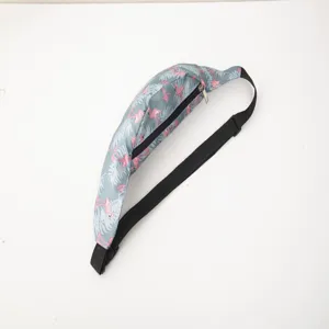 Macro detail of pink flamingo print on grey outdoor sports waist bag with strap