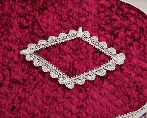 Korean style velvet toilet seat cover detail shot showing elegant white lace trim and rich red fabric.