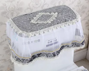 Detailed view of a luxury grey velvet and lace toilet lid dust cover, elegant home decor item.