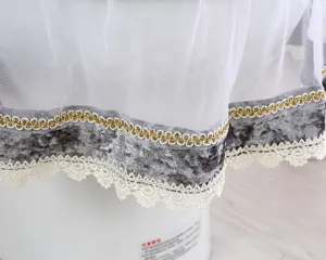 Detail view of Korean style white mesh grey velvet toilet seat cover with gold trim and lace.