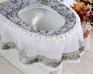 Korean style grey velvet toilet seat cover with white lace ruffles and gold trim details.