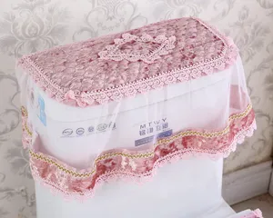 Detailed shot of pink gold velvet lace toilet tank cover with delicate decorative trim.