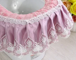 Korean style pink velvet toilet seat cover with exquisite lace embroidery and soft texture details.