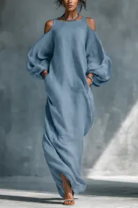 Detailed shot of a stylish blue long sleeve cold shoulder maxi dress with convenient pockets.