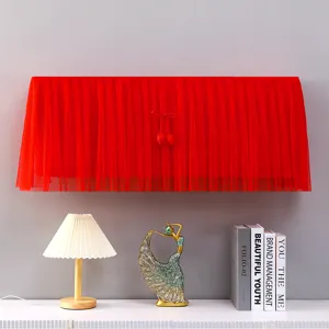 Red air conditioner dust cover fabric lace hanging style home decor interior display detail.