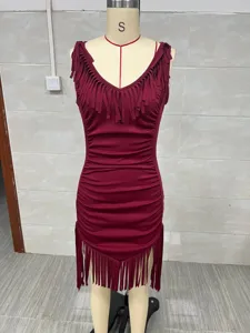 Vintage western style burgundy bodycon dress featuring fringe trim and ruched details
