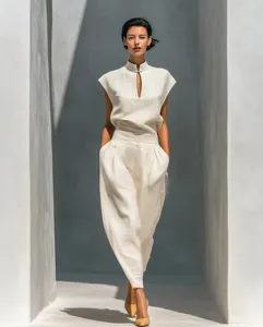 Elegant beige linen blend two-piece set featuring a mandarin collar and wide-leg pants.