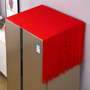 Red dust cover for home appliances with quilted top and mesh fringe skirt design.