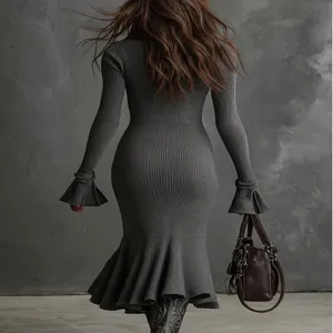 Back view detail of elegant long sleeve ribbed knit mermaid dress in charcoal gray color.
